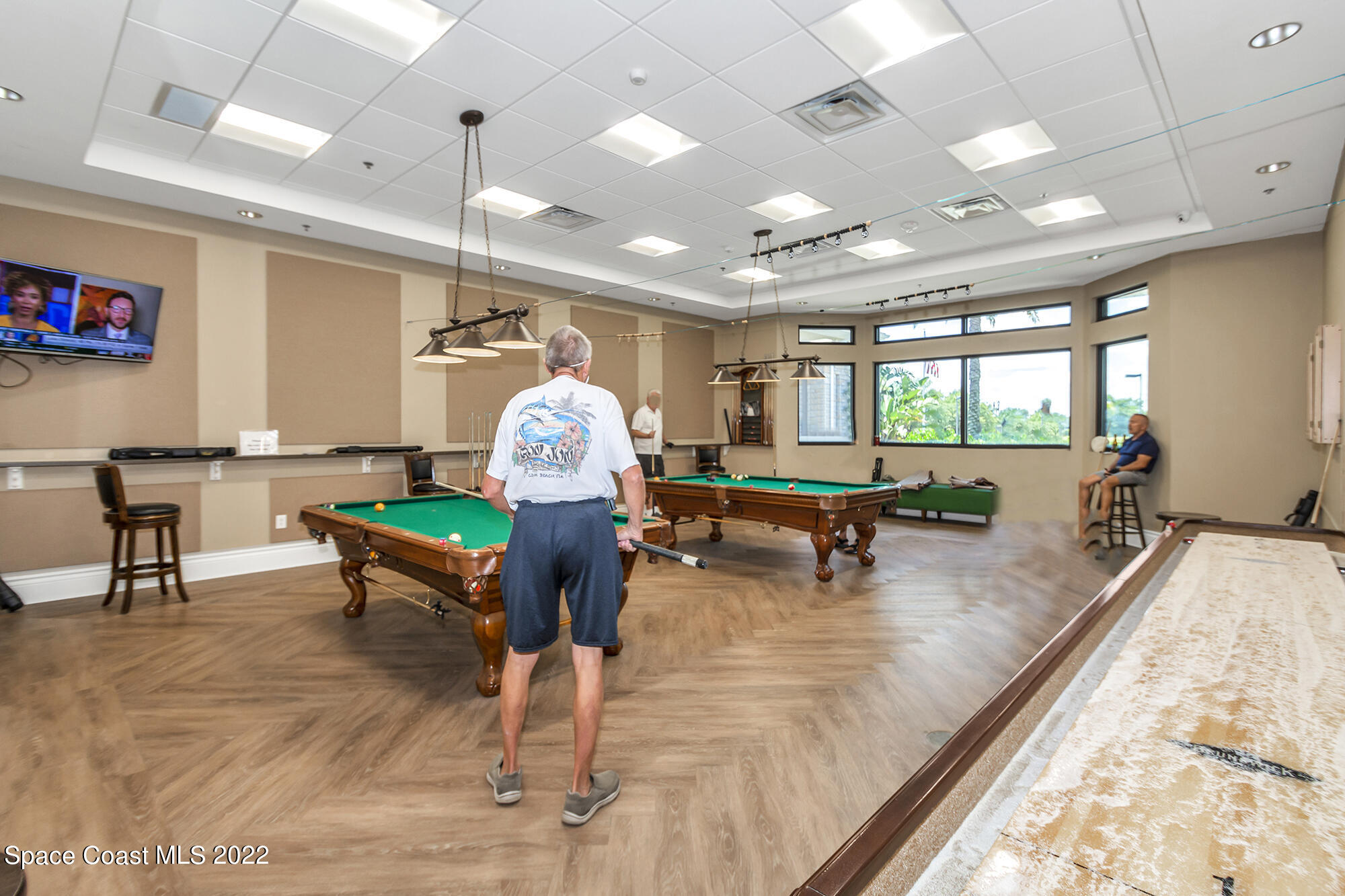 3151 Le Conte Street Melbourne, FL 32940 - Photo 29 of 30 a room with lots of tables and chairs