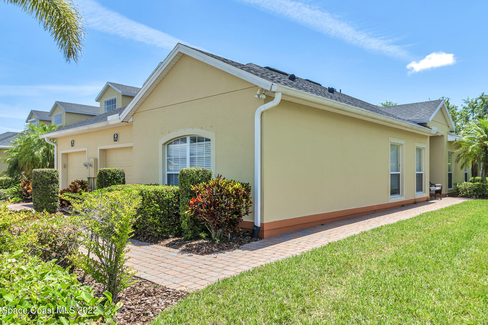 3151 Le Conte Street Melbourne, FL 32940 - Photo 6 of 30 a view of a house with wooden walls and a yard