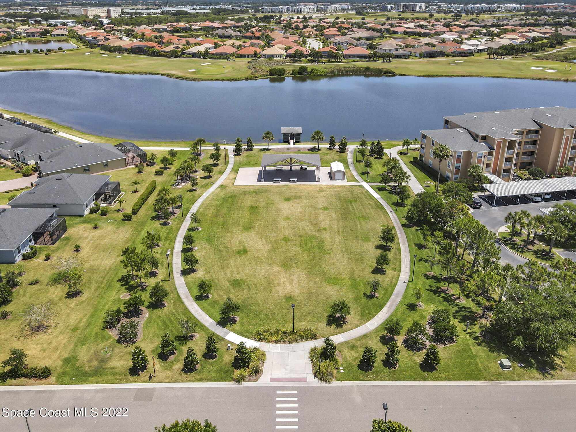 3151 Le Conte Street Melbourne, FL 32940 - Photo 8 of 30 view of outdoor space with swimming pool and outdoor seating