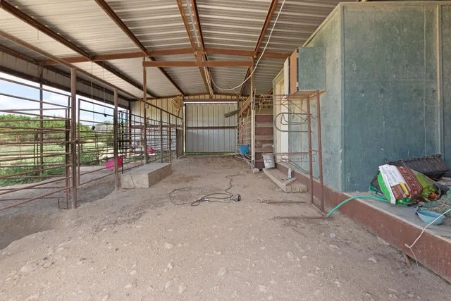 a view of a room with wooden walls