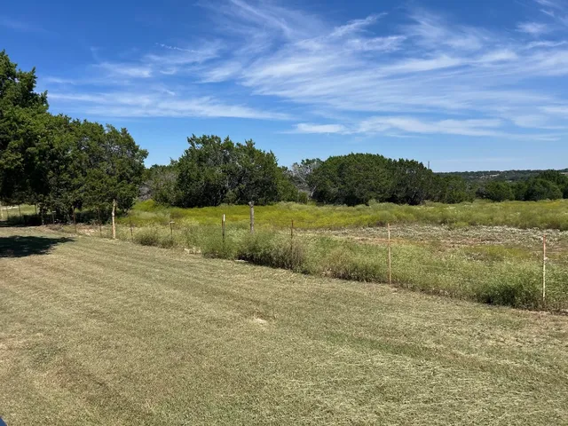 a view of an outdoor space and a yard