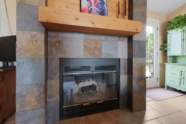 a kitchen with a refrigerator and a stove