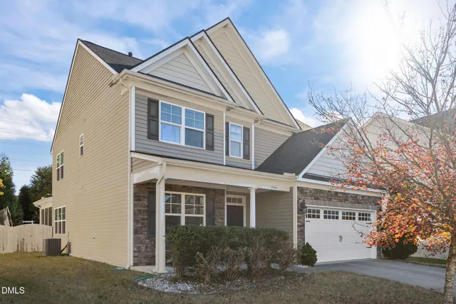 front view of a house with a street