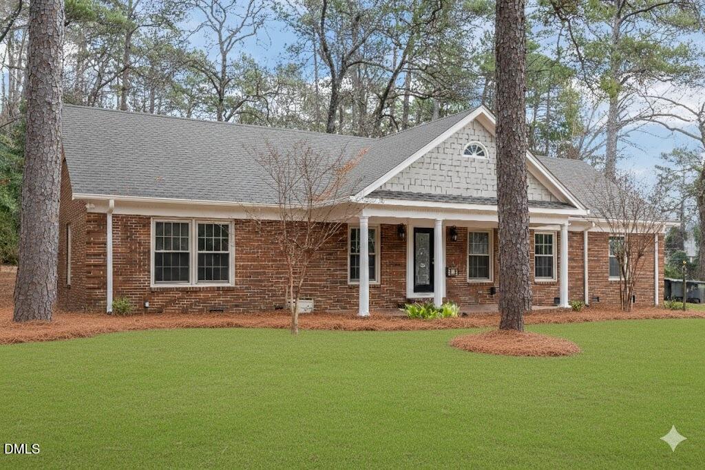 front view of a house with a yard