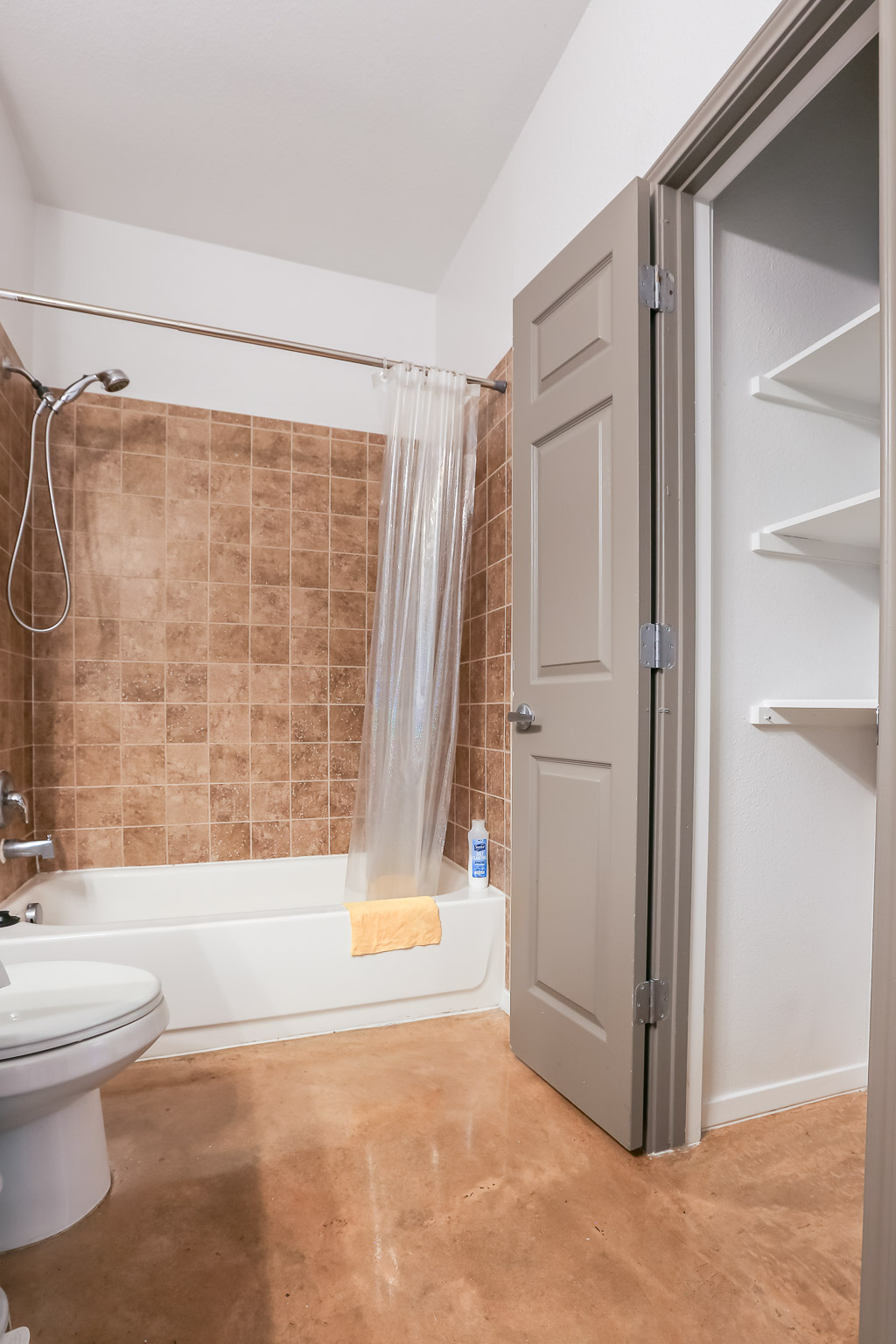 910 West 25th Street, Unit 509 Austin, TX 78705 - Photo 15 of 31 a bathroom with a bathtub and a shower
