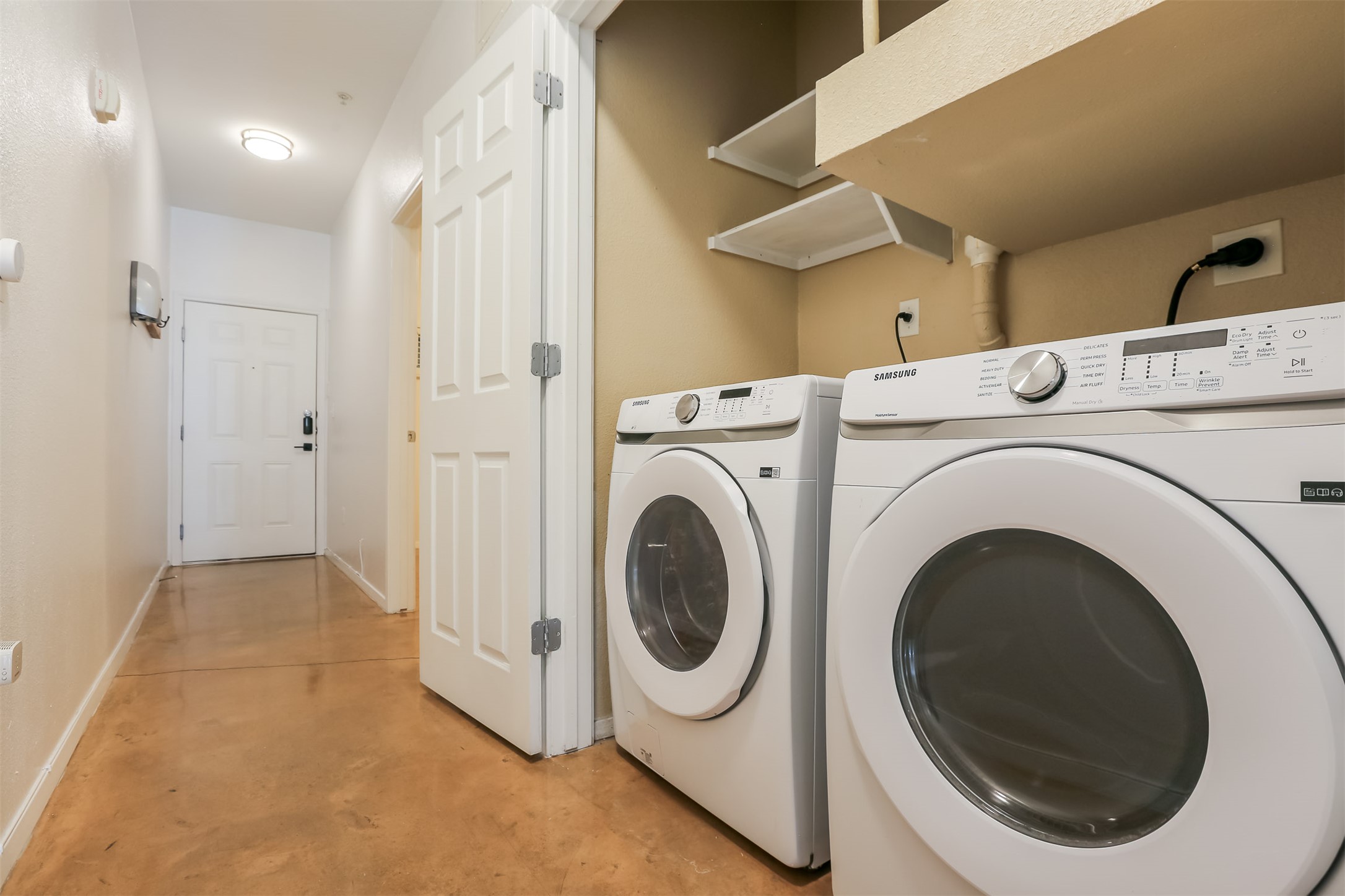 910 West 25th Street, Unit 509 Austin, TX 78705 - Photo 17 of 31 a utility room with dryer and washer