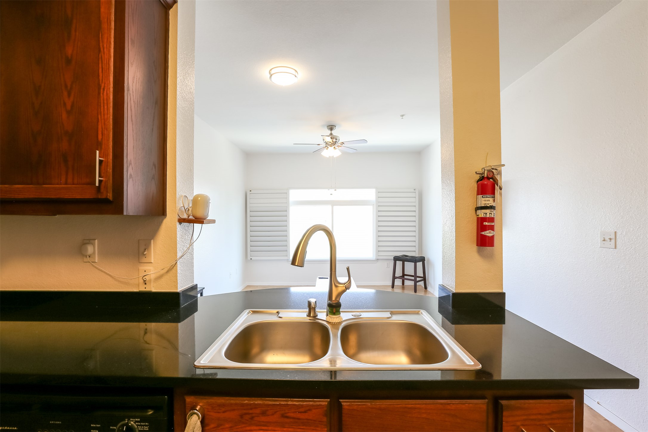 910 West 25th Street, Unit 509 Austin, TX 78705 - Photo 8 of 31 a kitchen with a sink and a microwave