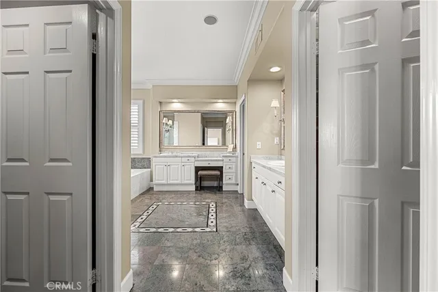 a view of a livingroom with wooden floor and windows