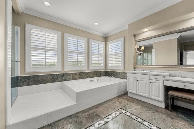 a spacious bathroom with a double vanity sink a mirror and a shower