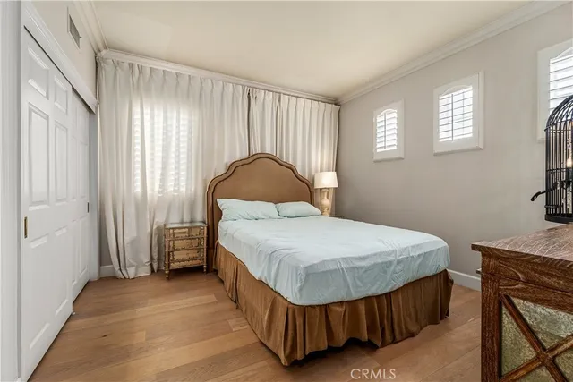 an aerial view of residential houses with city view