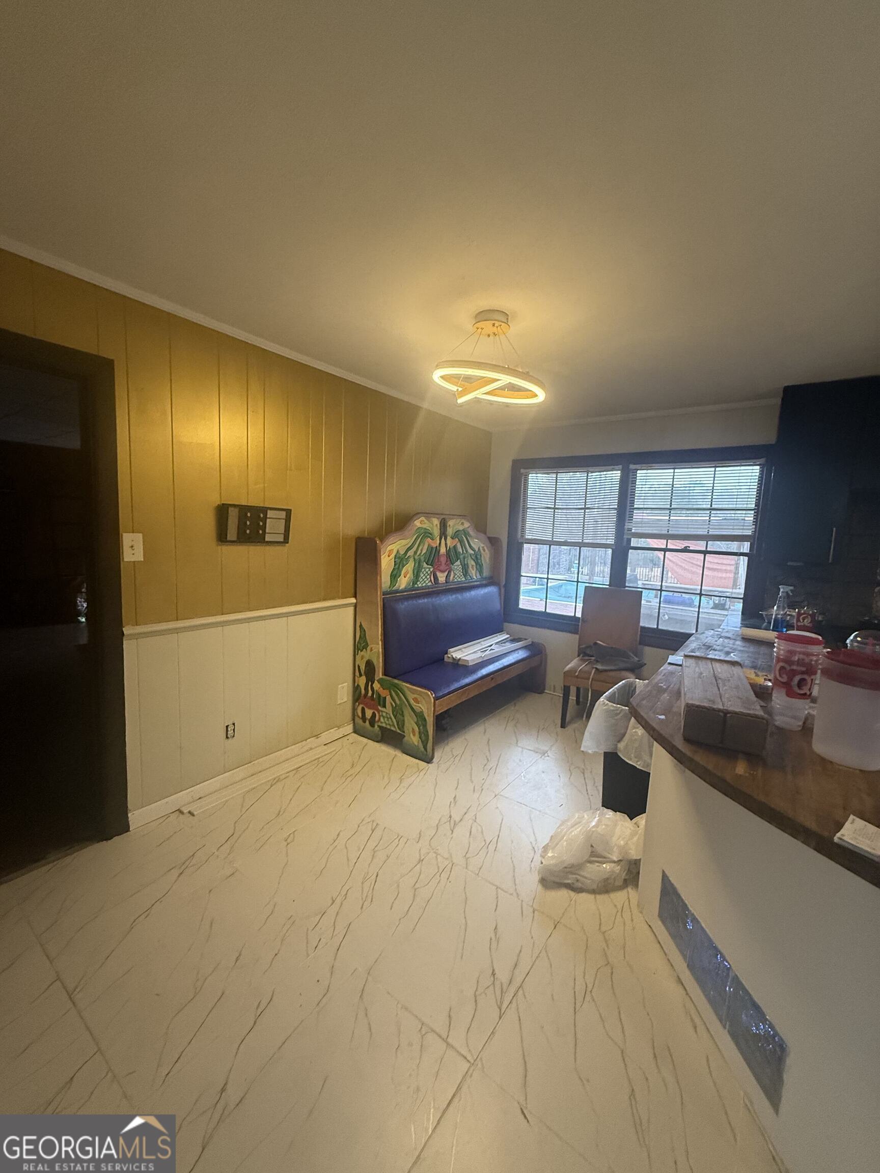 3861 Newnan Road Griffin, GA 30223 - Photo 35 of 89 a living room with furniture and a flat screen tv