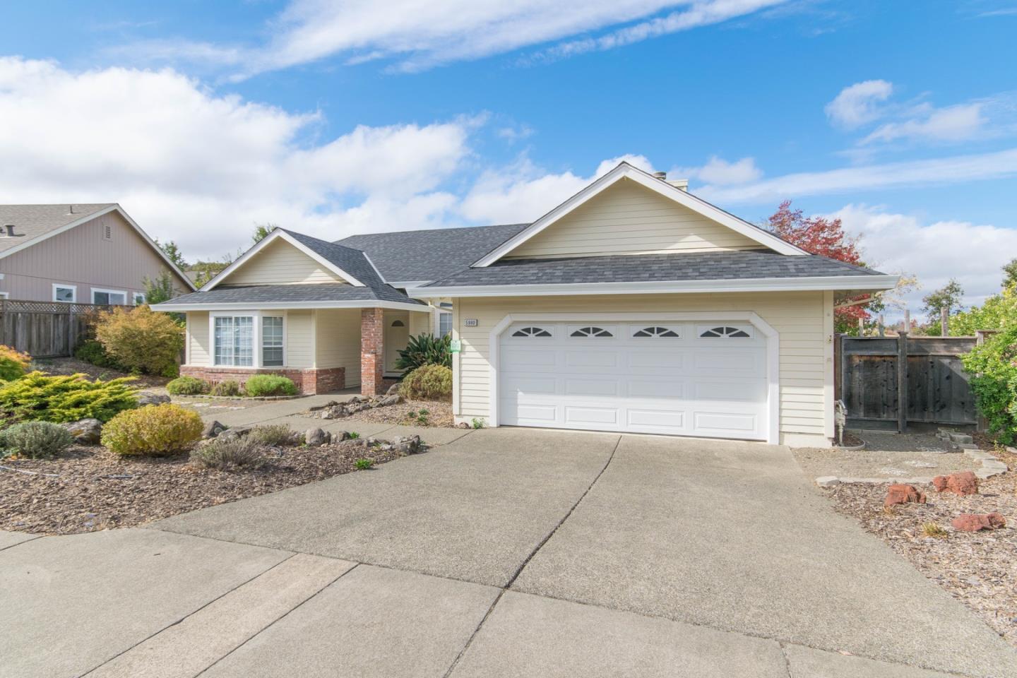 5980 Stone Bridge Road Santa Rosa, CA 95409 - Photo 24 of 24 a view of a house with backyard and garden