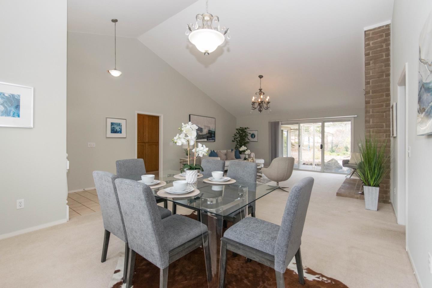 5980 Stone Bridge Road Santa Rosa, CA 95409 - Photo 4 of 24 a view of a dining room with furniture and chandelier