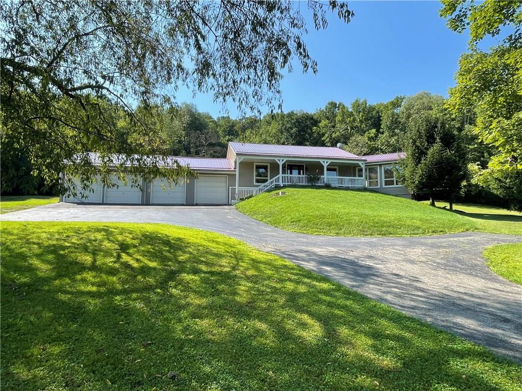656 Cheese Run Road Indiana, PA 15701 - Photo 1 of 16 a view of a house with a swimming pool