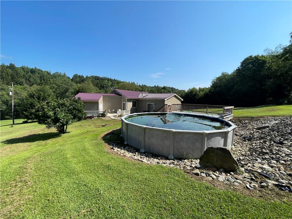 656 Cheese Run Road Indiana, PA 15701 - Photo 13 of 16 a view of a swimming pool with a yard