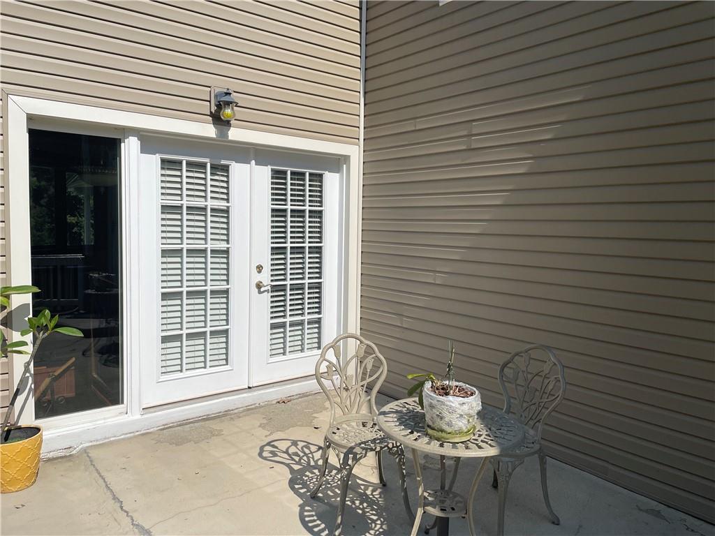 656 Cheese Run Road Indiana, PA 15701 - Photo 15 of 16 a view of a patio with chair and table in a patio
