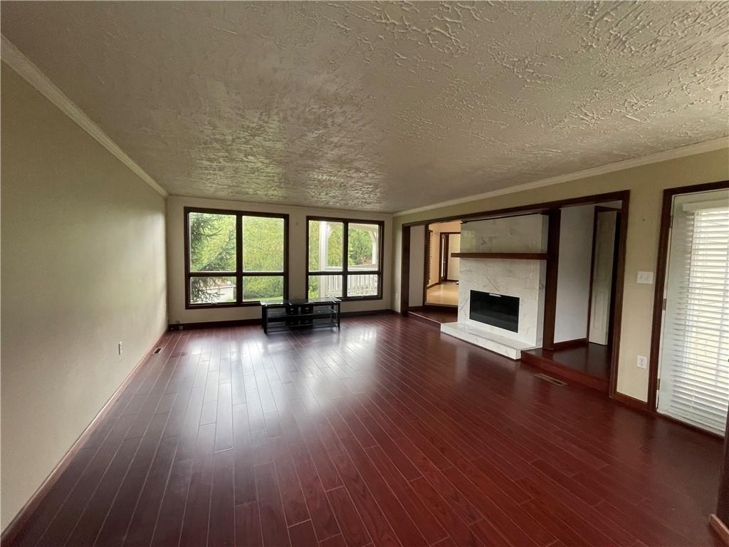 656 Cheese Run Road Indiana, PA 15701 - Photo 4 of 16 wooden floor in an empty room with a window