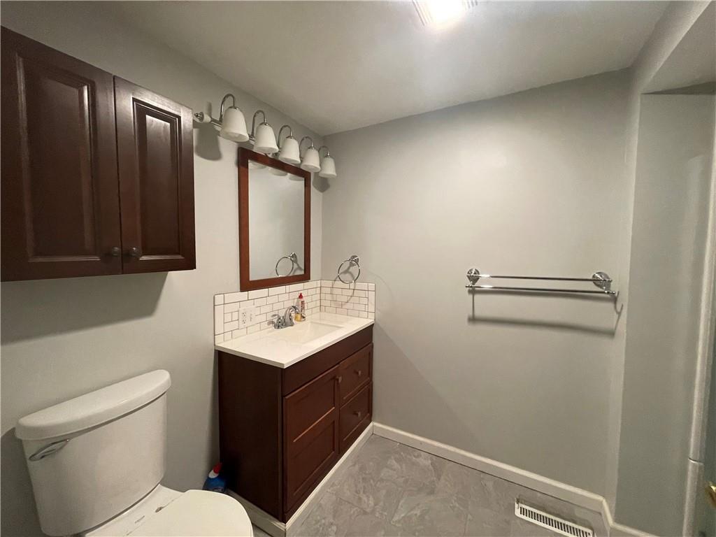 656 Cheese Run Road Indiana, PA 15701 - Photo 8 of 16 a bathroom with a sink a toilet and mirror