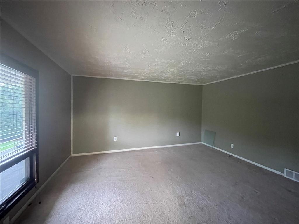 656 Cheese Run Road Indiana, PA 15701 - Photo 9 of 16 a view of an empty room with a window