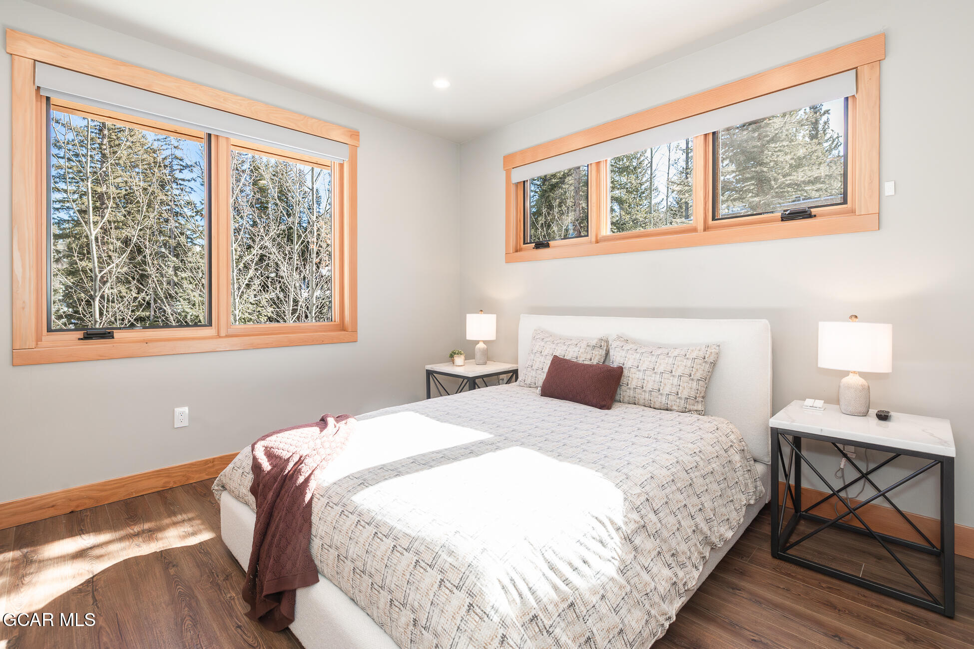 684 Vasquez Road Winter Park, CO 80482 - Photo 28 of 45 a bedroom with a bed and a window