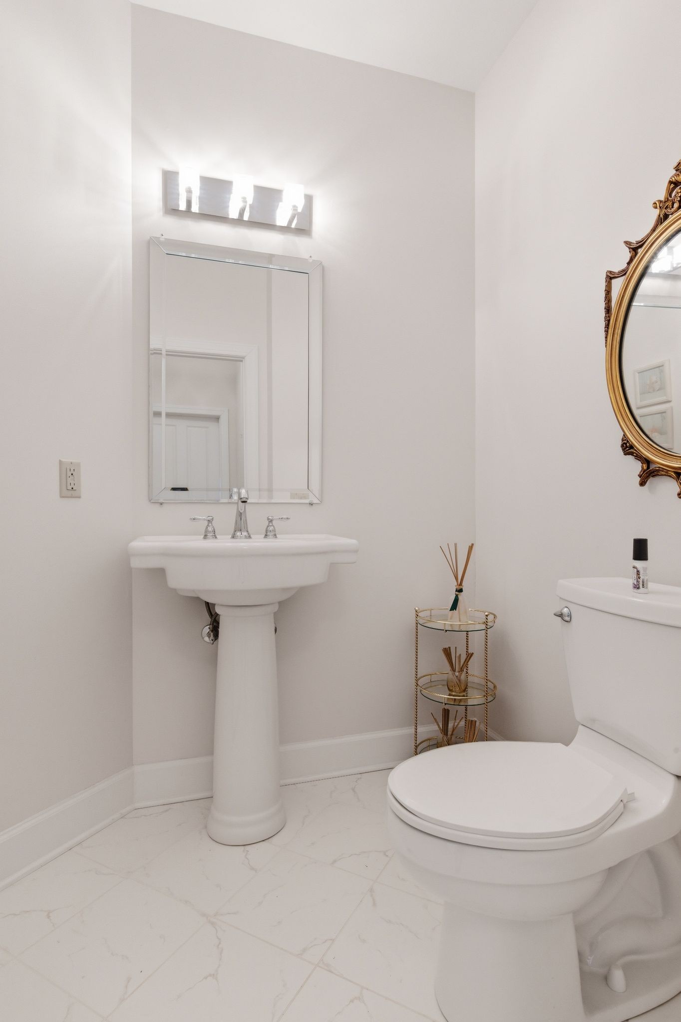 528 Country Club Drive Dickson, TN 37055 - Photo 32 of 55 a bathroom with a sink a toilet and mirror