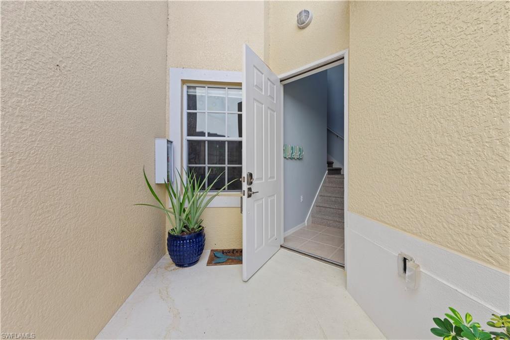 1285 Sweetwater Cove, Unit 2106 Naples, FL 34110 - Photo 37 of 38 a view of a closet area
