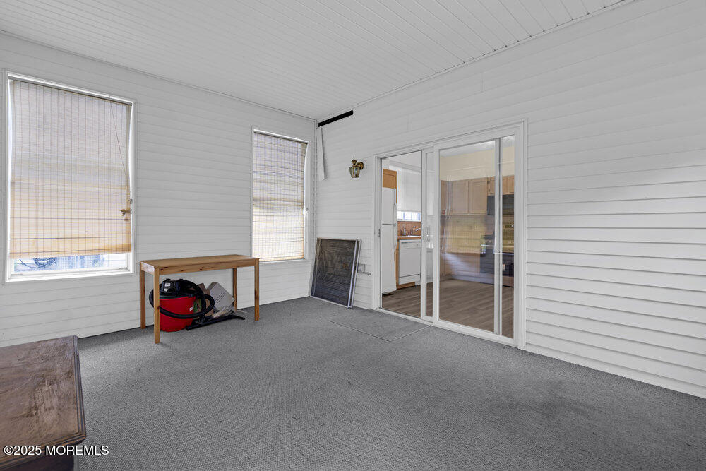 80 Quail Road Barnegat, NJ 08005 - Photo 12 of 27 a living room with furniture and a flat screen tv
