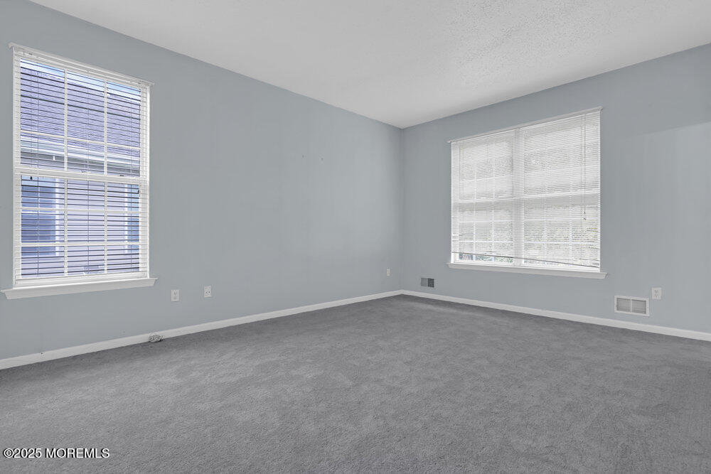 80 Quail Road Barnegat, NJ 08005 - Photo 16 of 27 a view of an empty room with a window