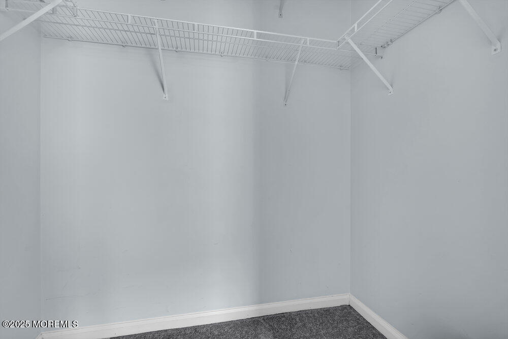 80 Quail Road Barnegat, NJ 08005 - Photo 19 of 27 a view of a room with racks on the wall