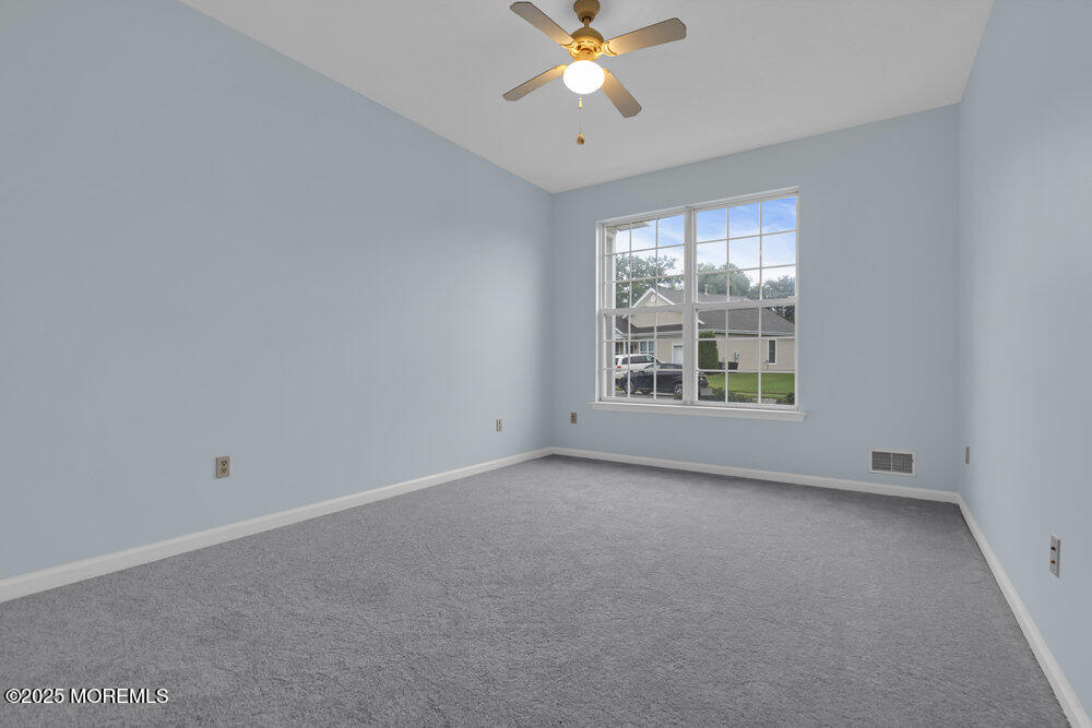 80 Quail Road Barnegat, NJ 08005 - Photo 20 of 27 an empty room with windows