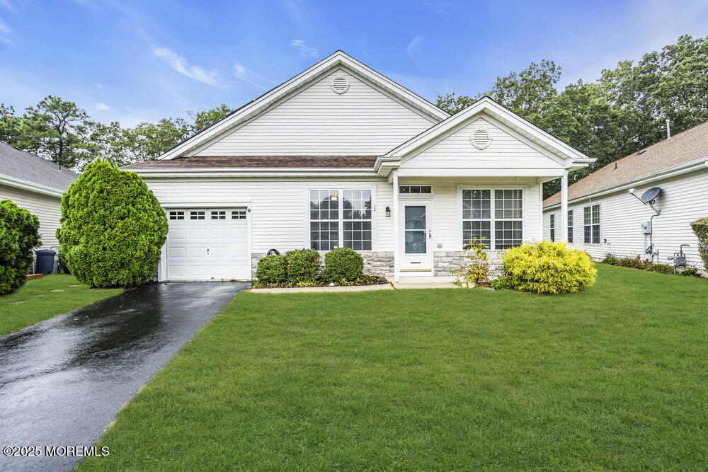 80 Quail Road Barnegat, NJ 08005 - Photo 26 of 27 a front view of a house with a yard