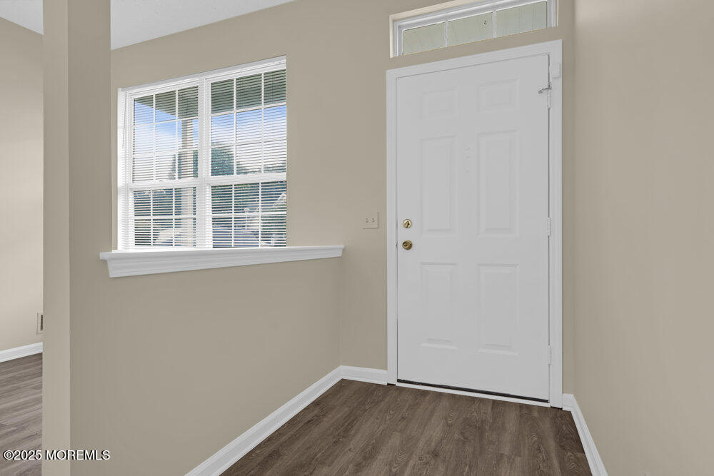 80 Quail Road Barnegat, NJ 08005 - Photo 4 of 27 a view of small space with wooden floor and windows