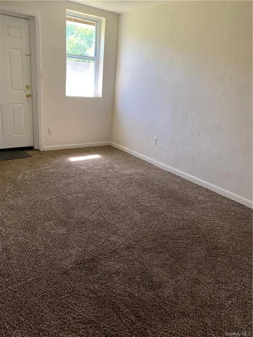 a kitchen with stainless steel appliances a refrigerator and cabinets