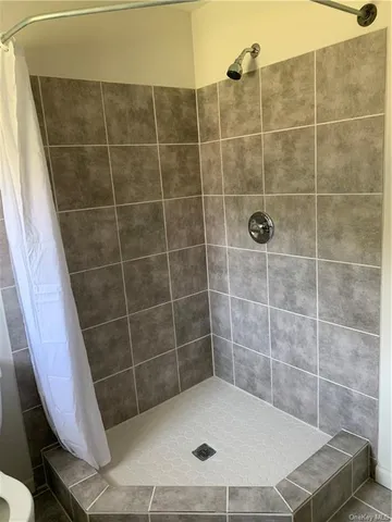 a bathroom with a toilet and a sink