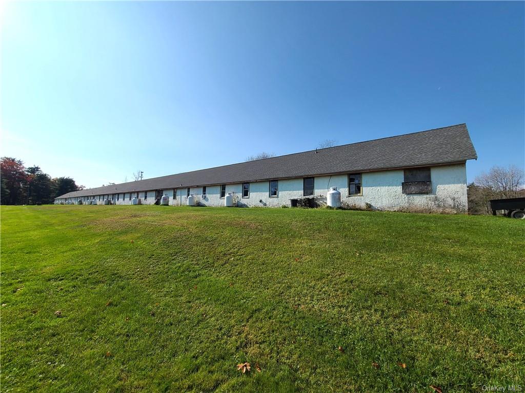 22 Arrowhead Apartments Road Narrowsburg, NY 12764 - Photo 9 of 34 a front view of house with garden
