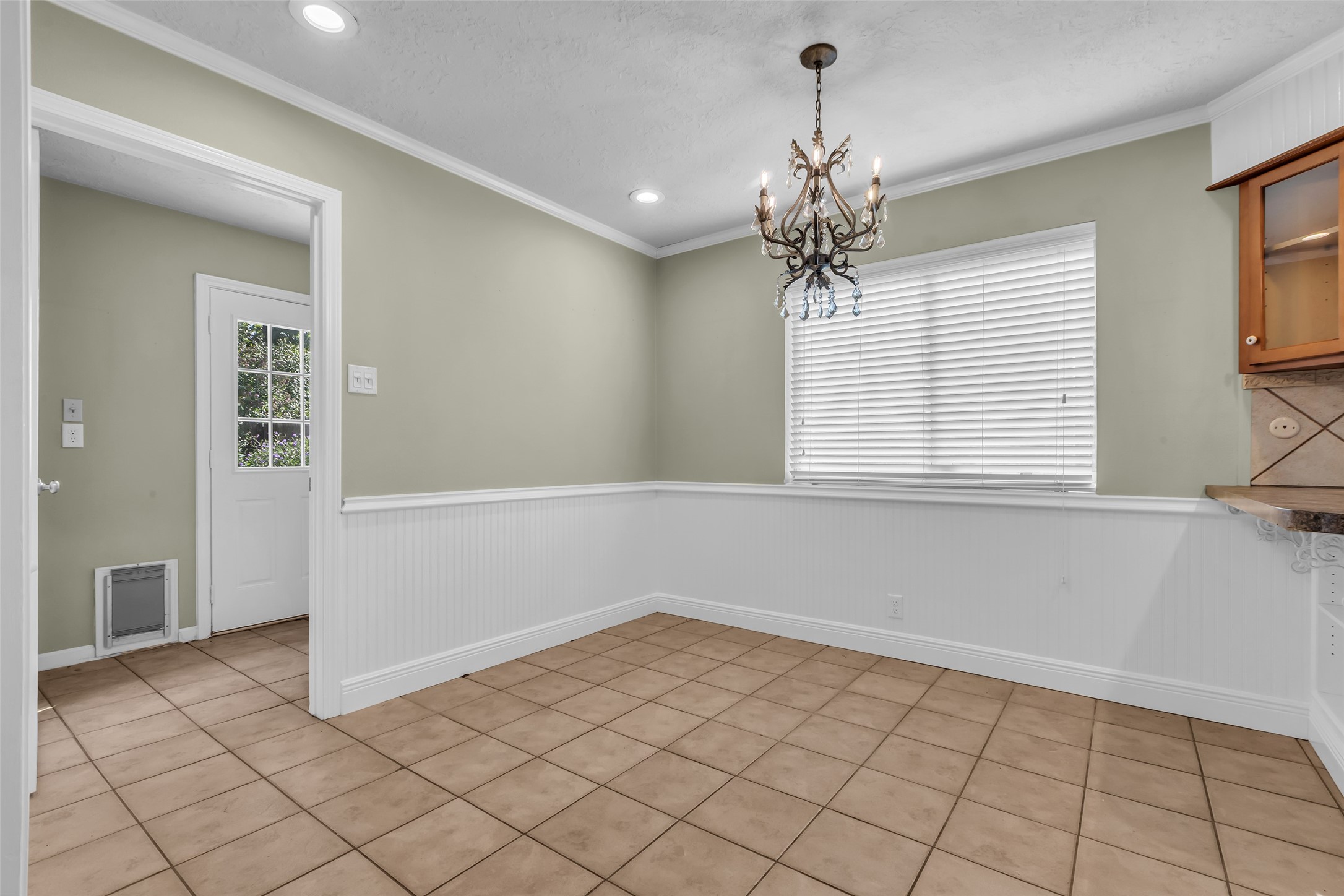 23826 Farm Hill Drive Spring, TX 77373 - Photo 15 of 38 a view of a livingroom with a chandelier fan and windows