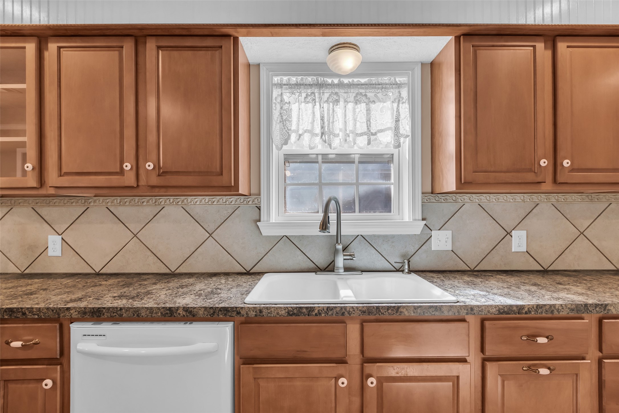 23826 Farm Hill Drive Spring, TX 77373 - Photo 16 of 38 a kitchen with stainless steel appliances granite countertop a refrigerator and cabinets