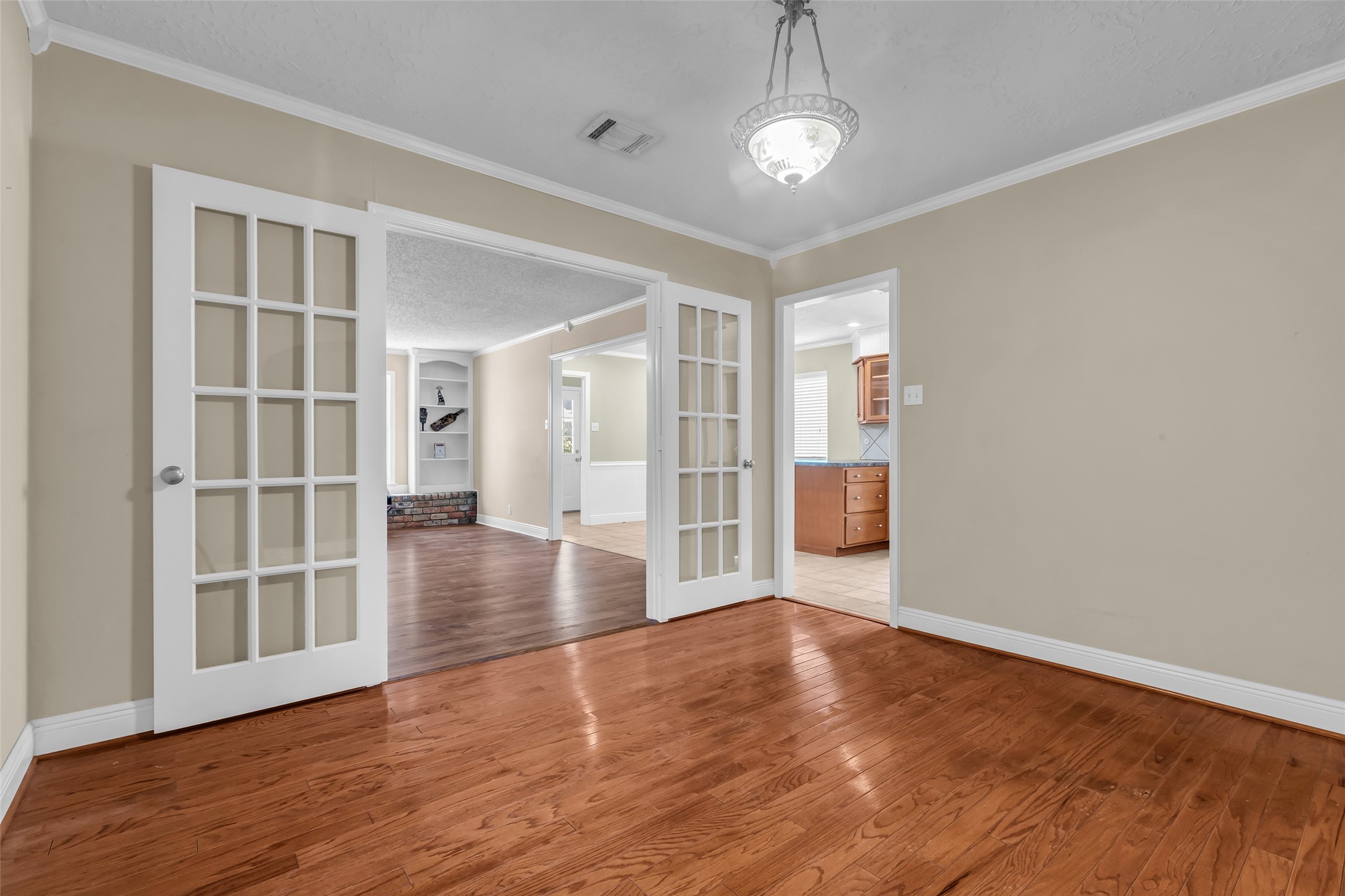 23826 Farm Hill Drive Spring, TX 77373 - Photo 23 of 38 wooden floor in an empty room with a window