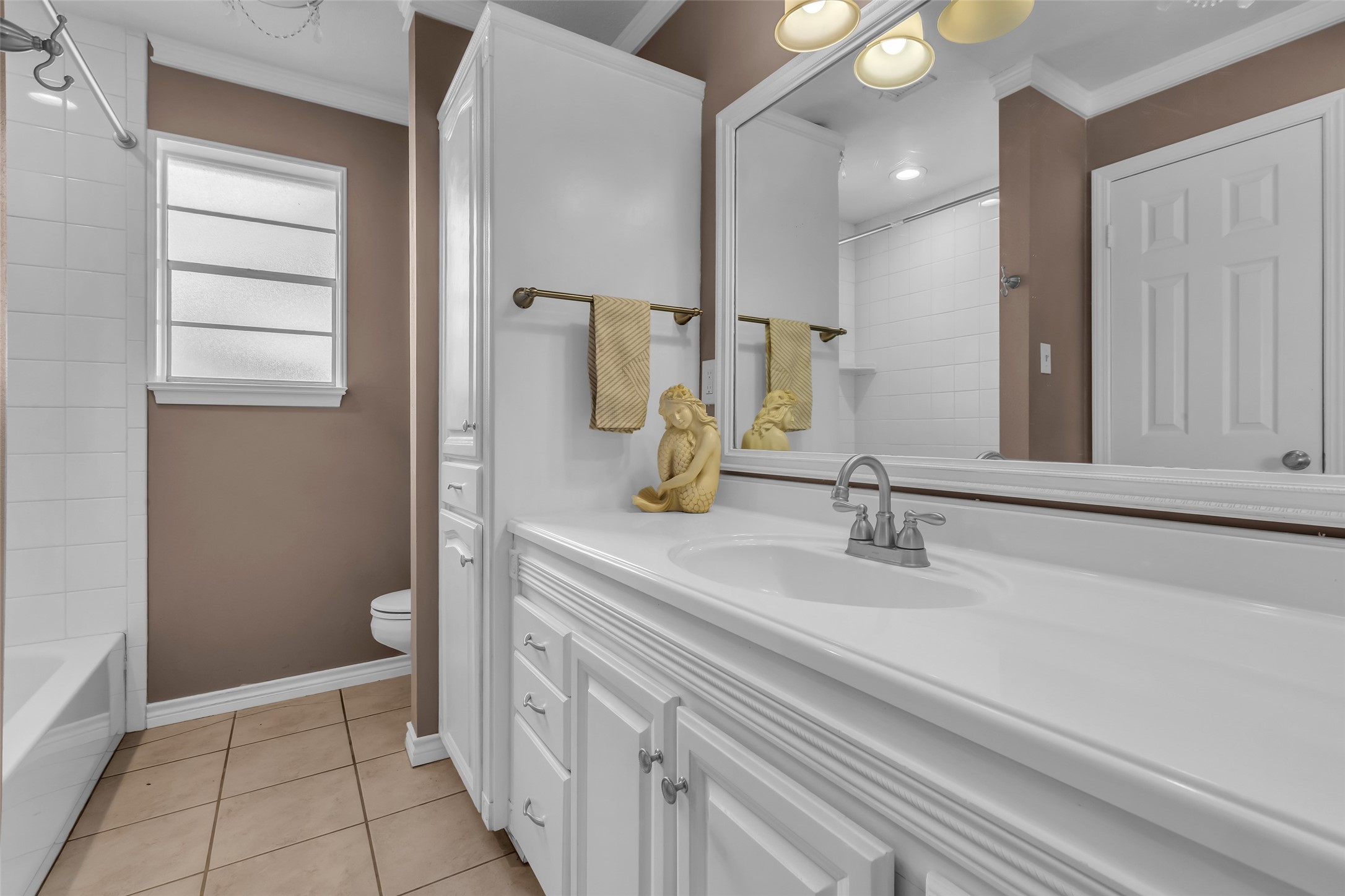 23826 Farm Hill Drive Spring, TX 77373 - Photo 27 of 38 a bathroom with a sink and a mirror