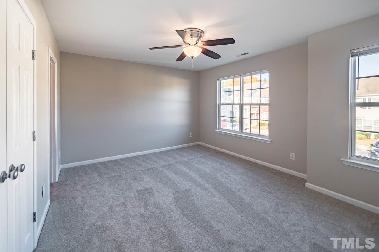 8453 Reedy Ridge Lane Raleigh, NC 27613 - Photo 11 of 21 a view of an empty room with a window