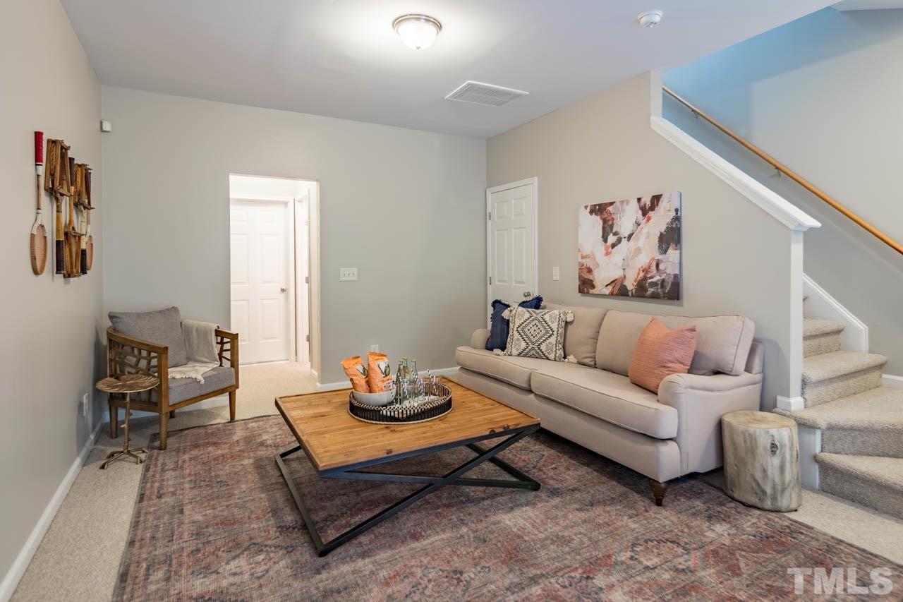 8453 Reedy Ridge Lane Raleigh, NC 27613 - Photo 14 of 21 a living room with furniture