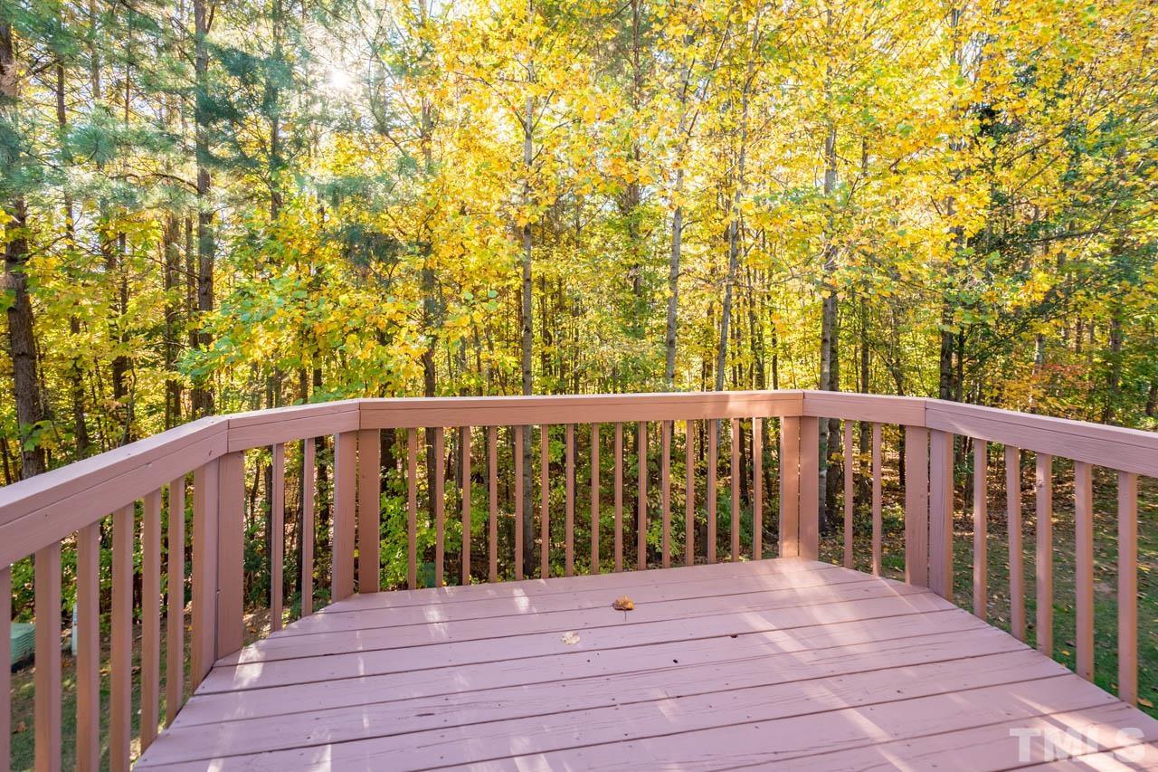 8453 Reedy Ridge Lane Raleigh, NC 27613 - Photo 18 of 21 a view of balcony with wooden floor