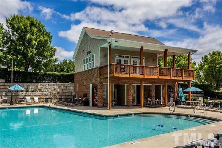 8453 Reedy Ridge Lane Raleigh, NC 27613 - Photo 20 of 21 a view of house with a yard