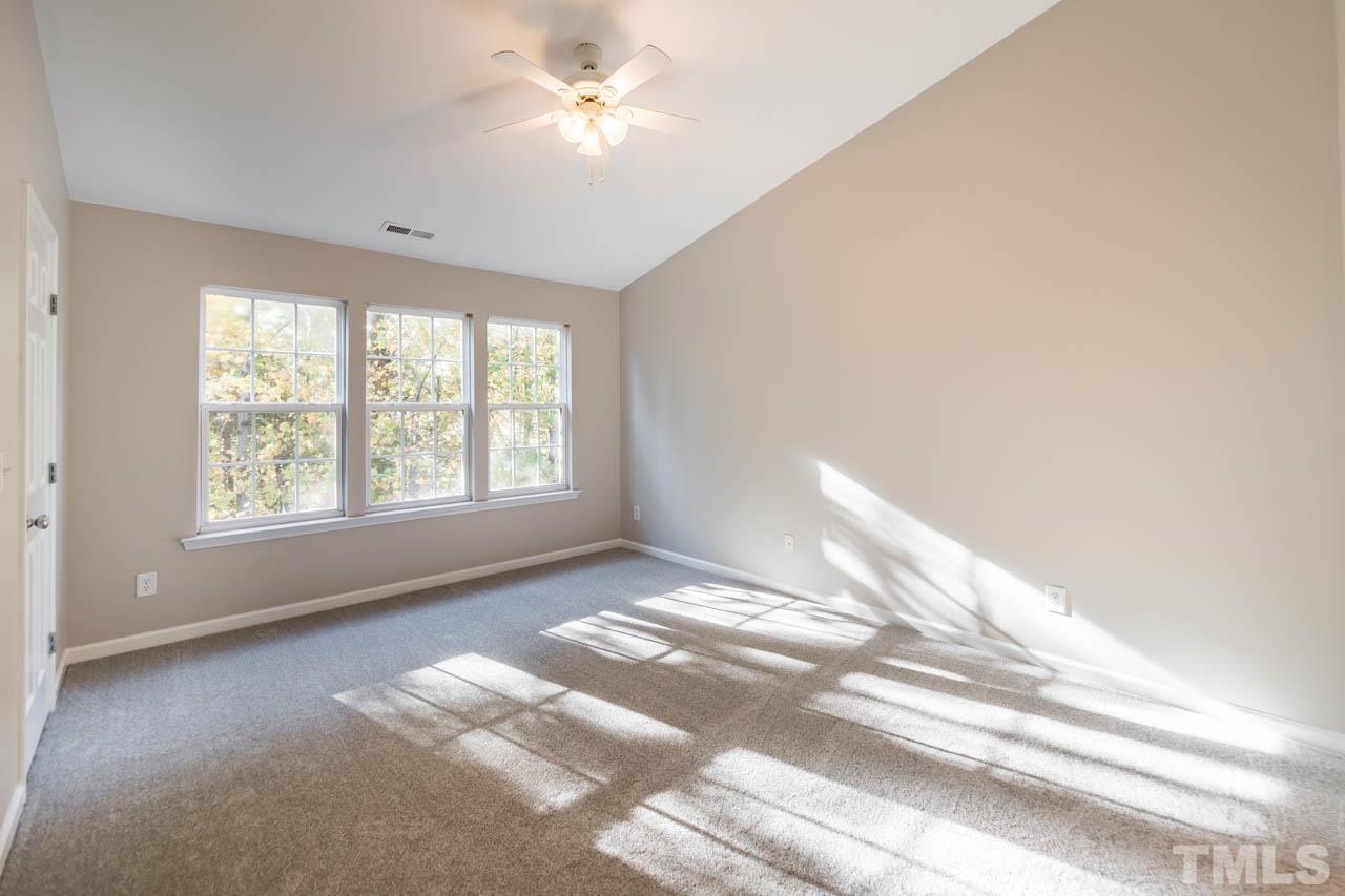 8453 Reedy Ridge Lane Raleigh, NC 27613 - Photo 9 of 21 a view of empty room with window