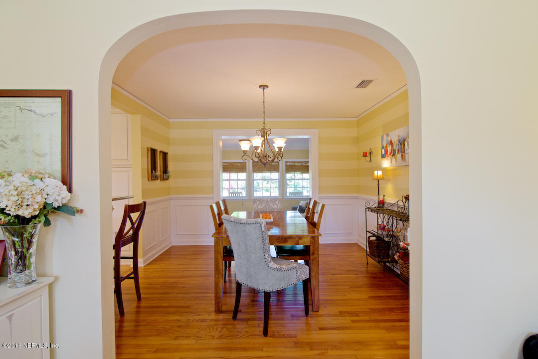 1405 Mapleton Road Jacksonville, FL 32207 - Photo 13 of 29 a view of a dining room with furniture and window