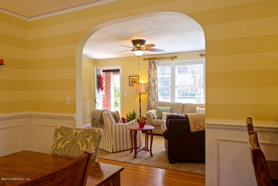 1405 Mapleton Road Jacksonville, FL 32207 - Photo 6 of 29 a living room with furniture and a window