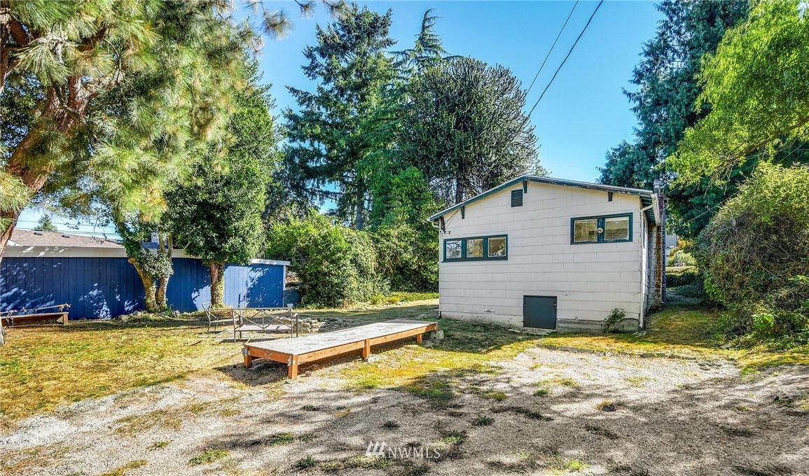 7511 14th Avenue Southwest Seattle, WA 98106 - Photo 13 of 16 a view of a house with swimming pool and sitting area