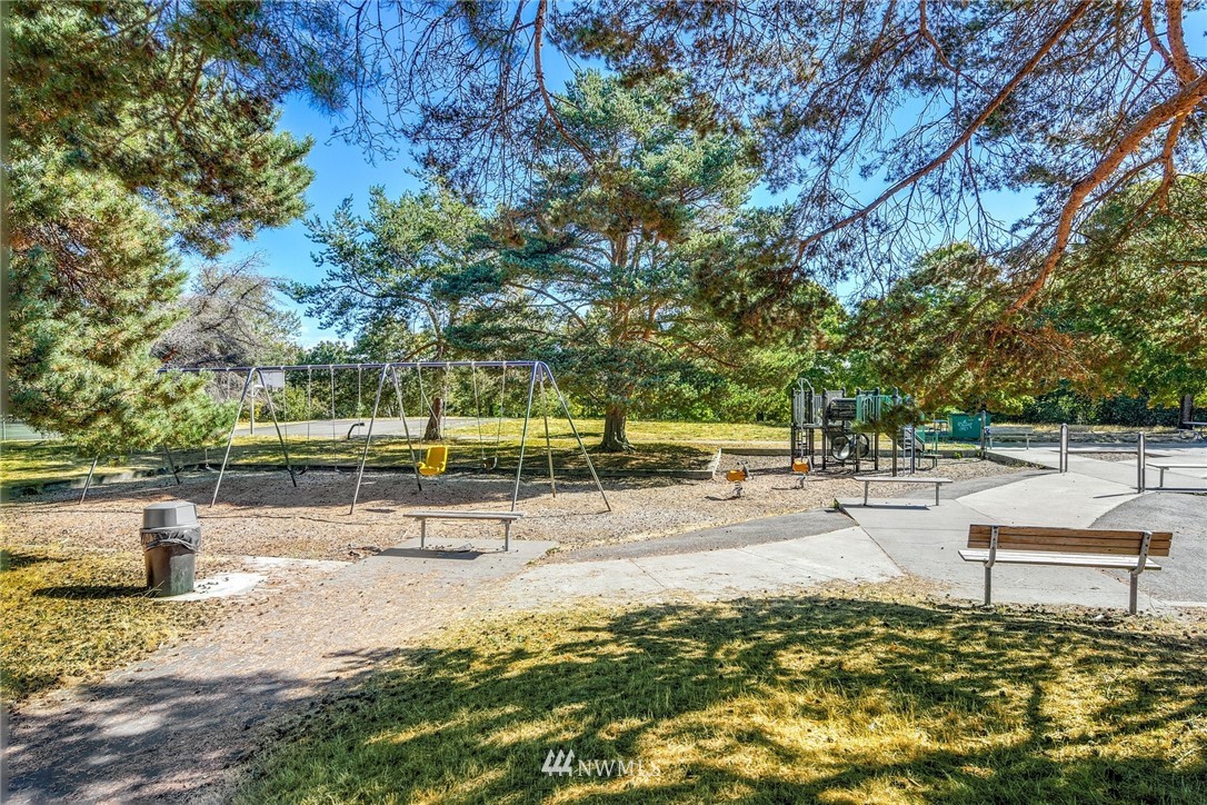 7511 14th Avenue Southwest Seattle, WA 98106 - Photo 15 of 16 a view of a park with swings