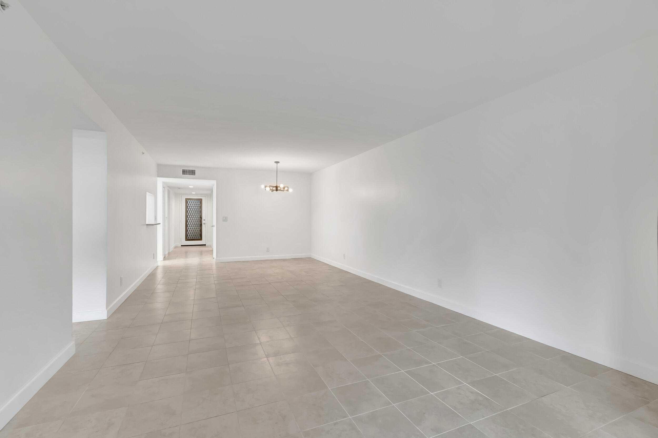 15364 Lakes Of Delray Boulevard, Unit 45 Delray Beach, FL 33484 - Photo 22 of 56 a view of a big room with closet and windows