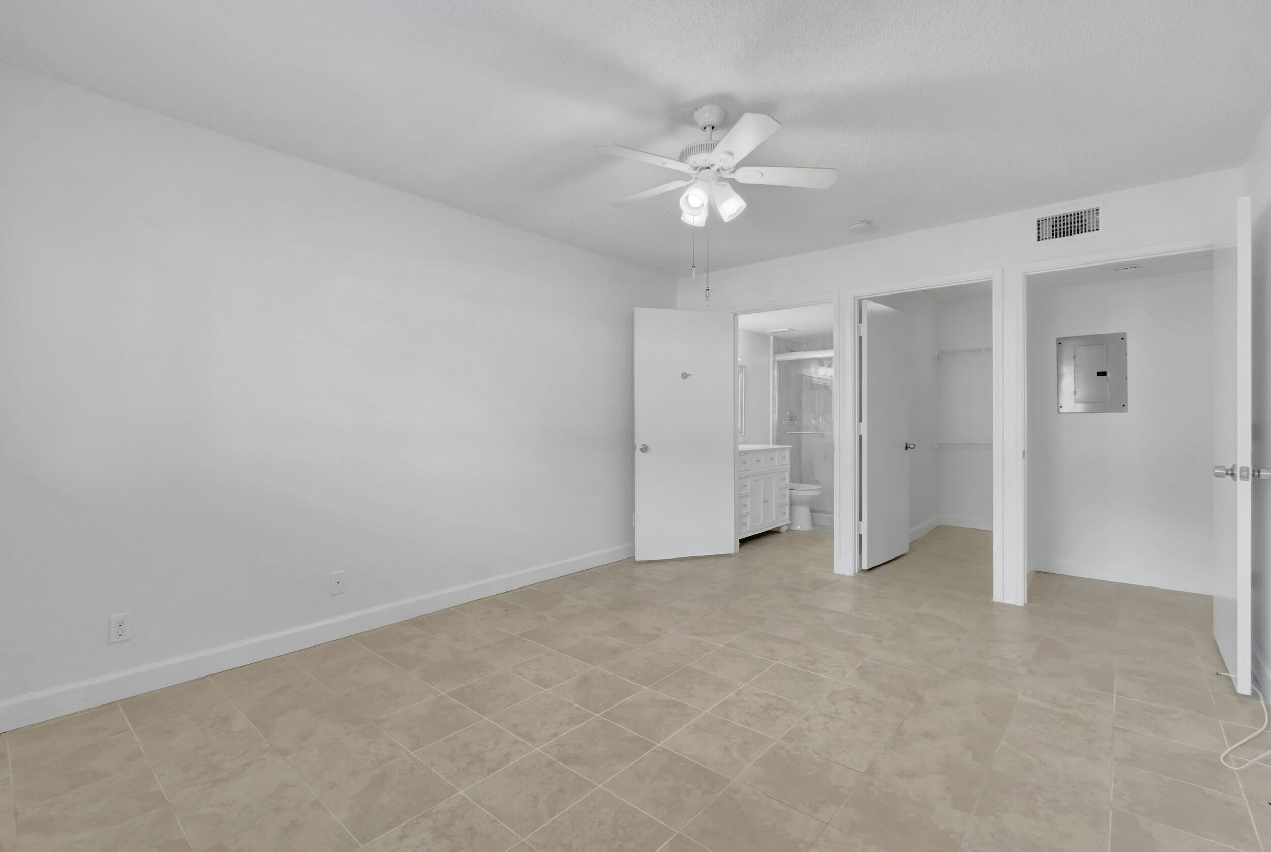 15364 Lakes Of Delray Boulevard, Unit 45 Delray Beach, FL 33484 - Photo 33 of 56 a view of an empty room with a fan